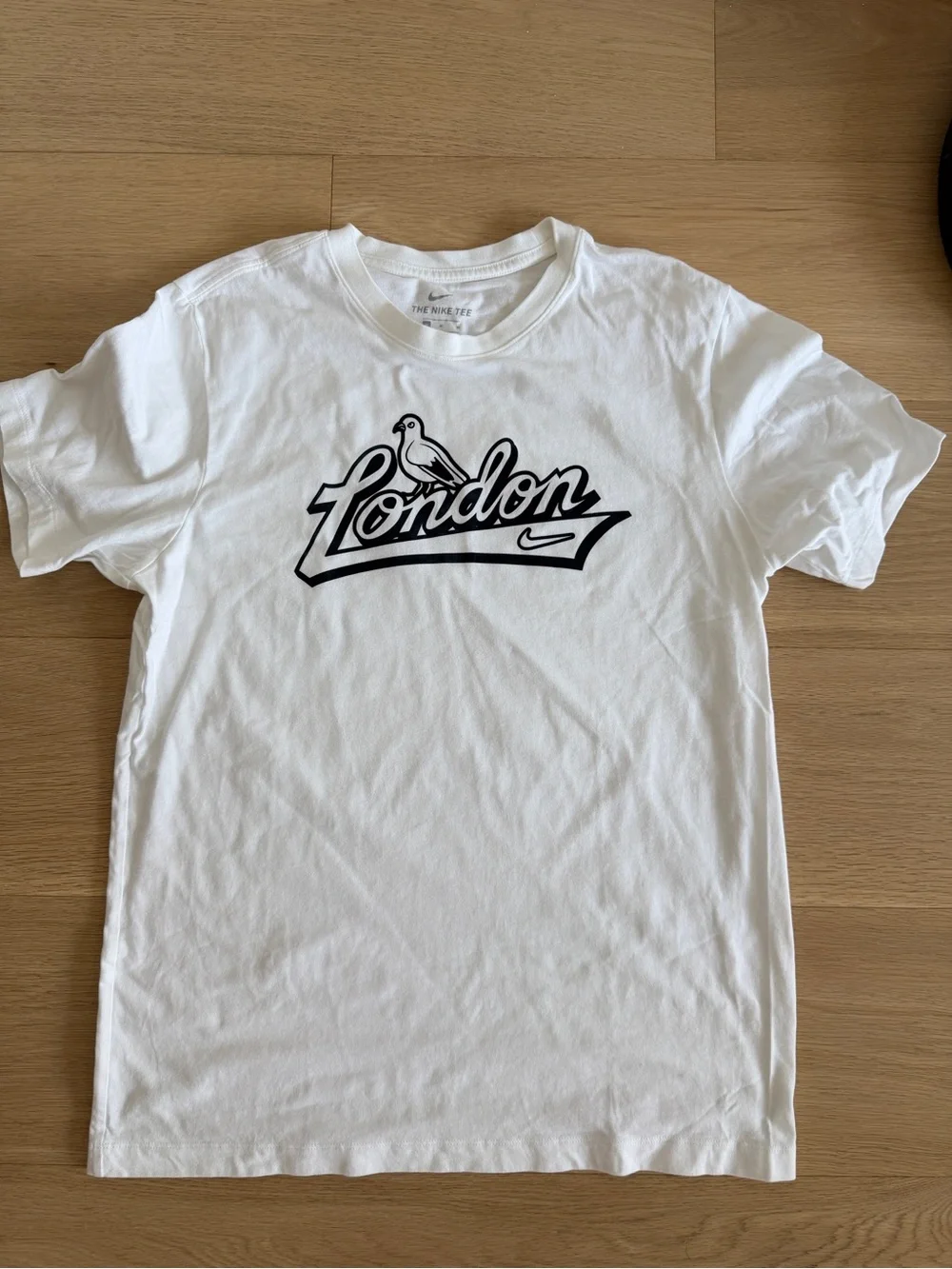 Nike White T-Shirt with Black 'London' Graphic and Pigeon